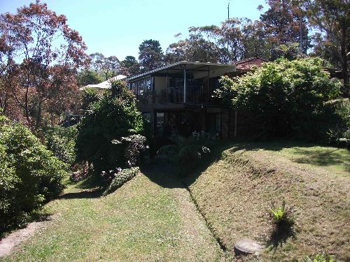 2 HOUSES FOR THE PRICE OF ONE - 1.5 ACRES AND 2 TITLES