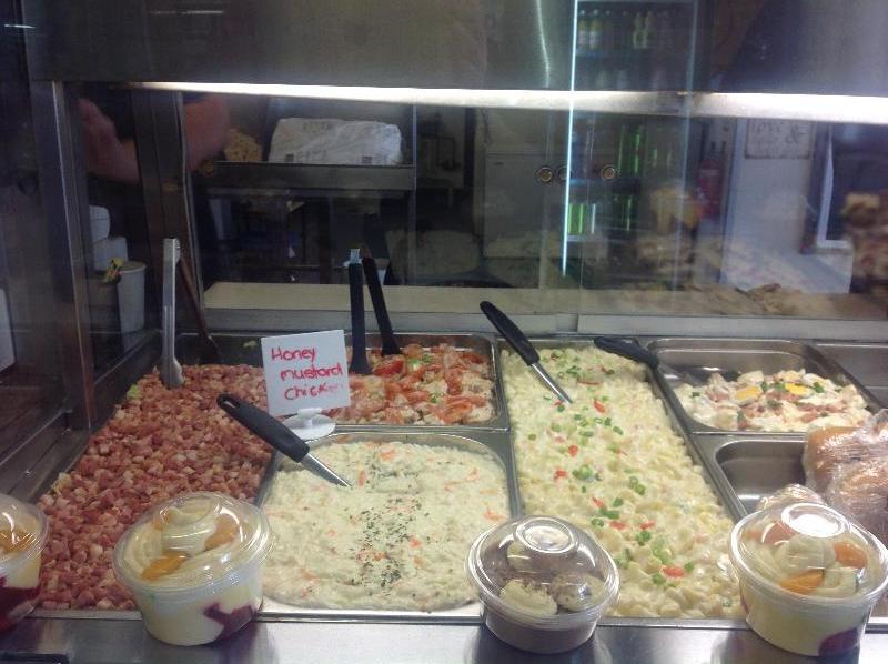 Johnos BBQ chickens salads and seafood