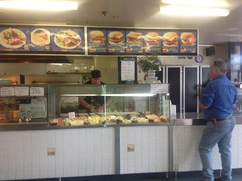 Johnos BBQ chickens salads and seafood