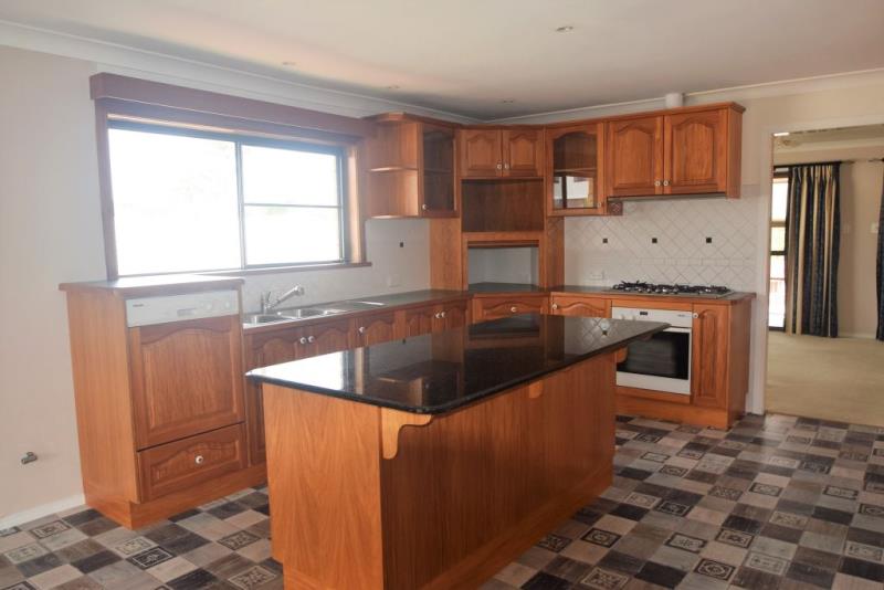 Spacious home with low maintenance lifestyle-pool+grounds maintained. Solar!