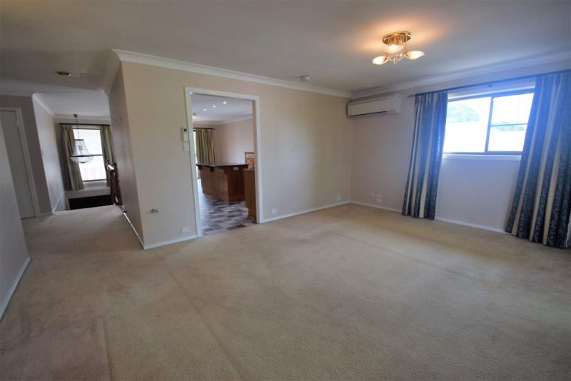 Spacious home with low maintenance lifestyle-pool+grounds maintained. Solar!