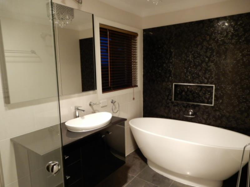 Spacious home with low maintenance lifestyle-pool+grounds maintained. Solar!