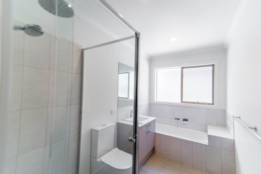 Open plan 2 bedroom unit including lock-up garage