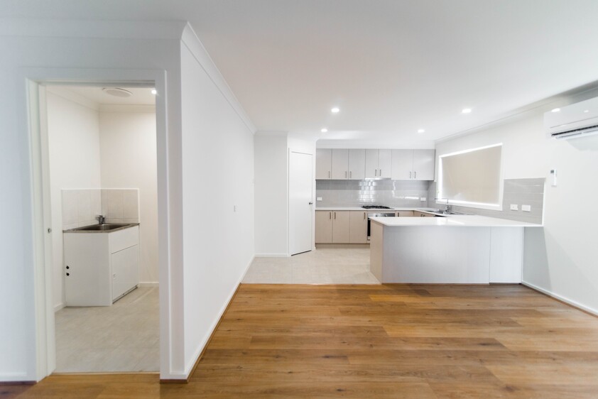 Open plan 2 bedroom unit including lock-up garage
