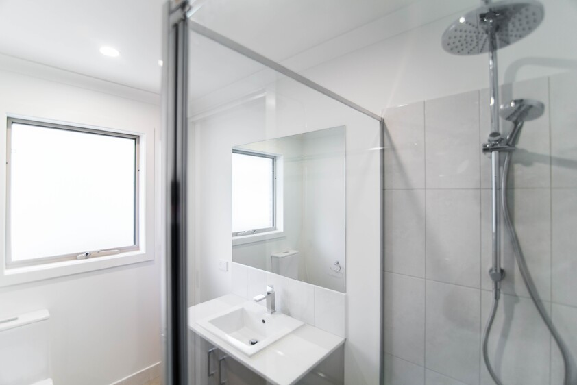 Open plan 2 bedroom unit including lock-up garage