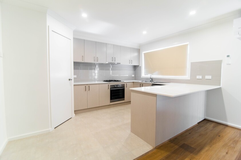 Open plan 2 bedroom unit including lock-up garage