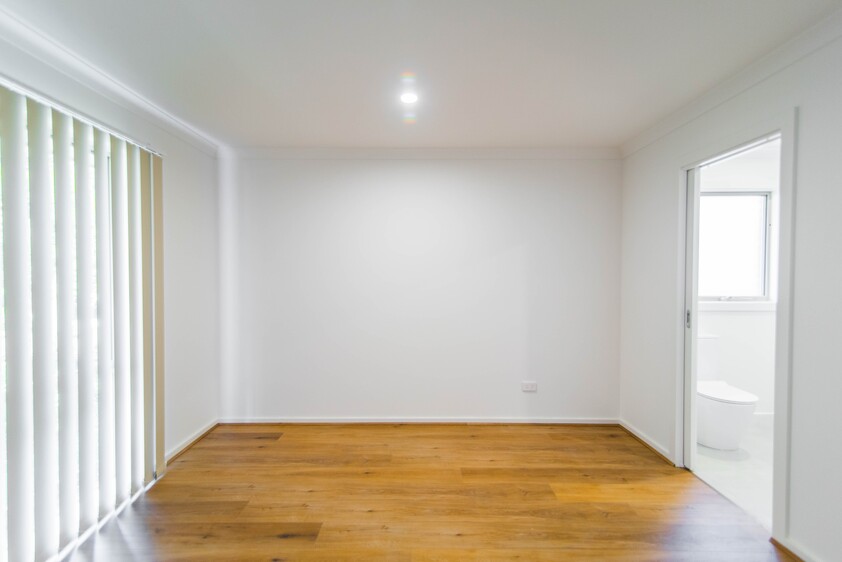 Open plan 2 bedroom unit including lock-up garage
