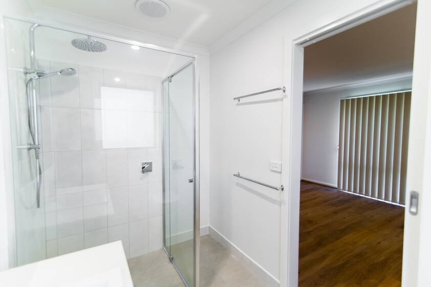Open plan 2 bedroom unit including lock-up garage