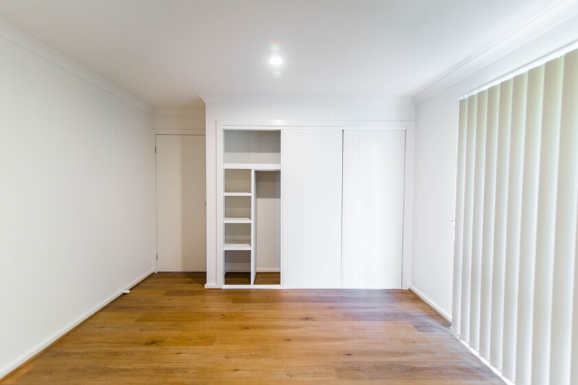 Open plan 2 bedroom unit including lock-up garage