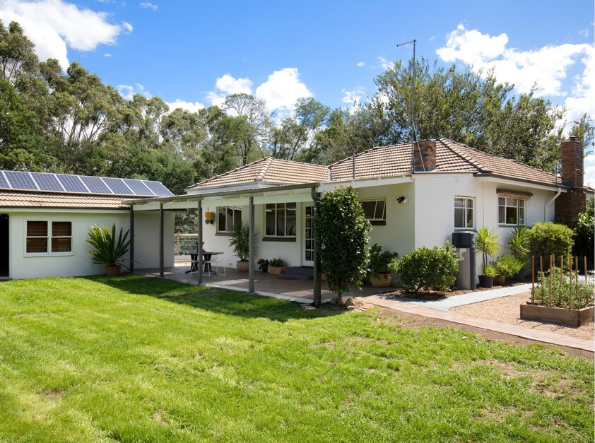 ZONED INDUSTRIAL/COMMERCIAL - KNOWN AS 'ROSE COTTAGE' ON THE THOMSON RIVER