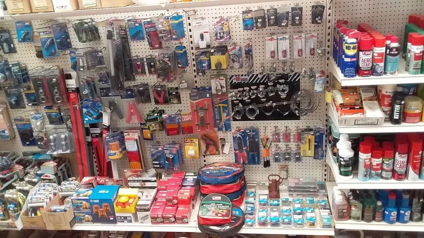 Hardware store, food retail and residence, with successful income sources attached