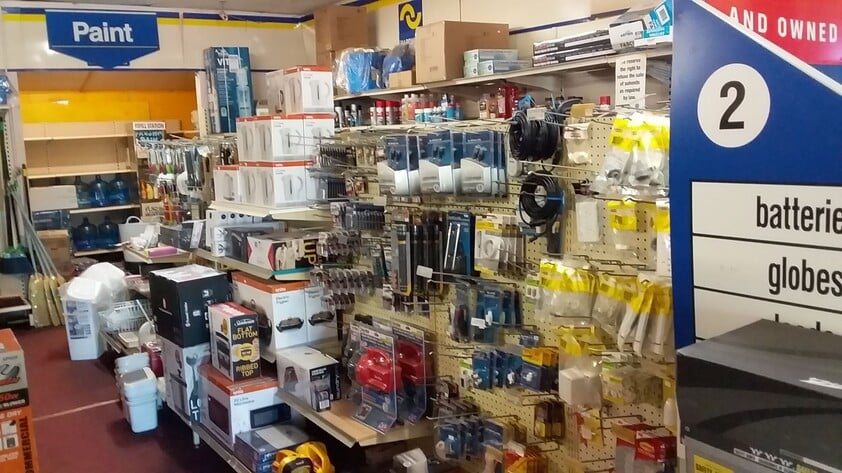 Hardware store, food retail and residence, with successful income sources attached