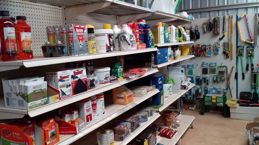 Hardware store, food retail and residence, with successful income sources attached