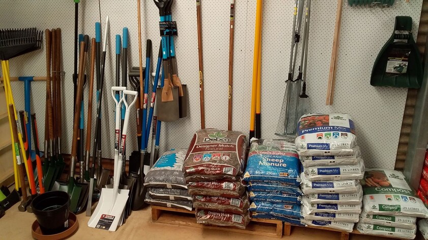 Hardware store, food retail and residence, with successful income sources attached