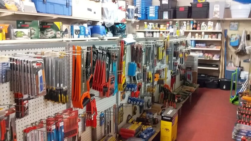 Hardware store, food retail and residence, with successful income sources attached