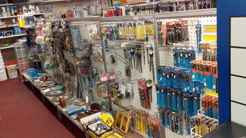 Hardware store, food retail and residence, with successful income sources attached