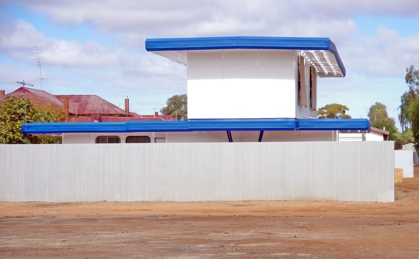 Hardware store, food retail and residence, with successful income sources attached