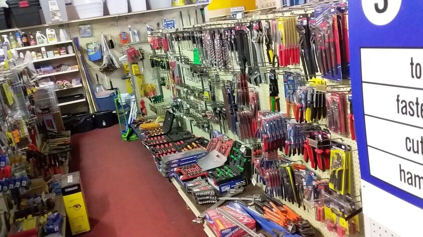 Hardware store, food retail and residence, with successful income sources attached