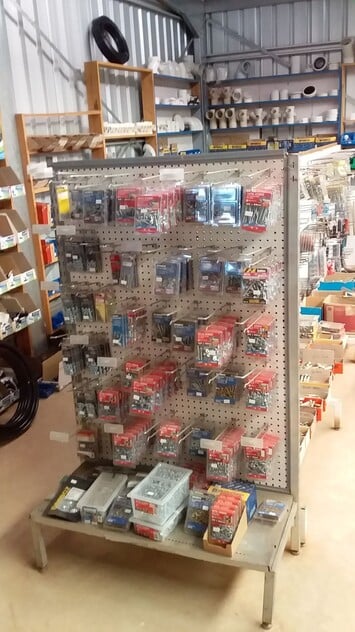 Hardware store, food retail and residence, with successful income sources attached