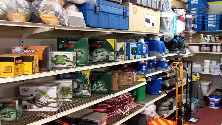 Hardware store, food retail and residence, with successful income sources attached
