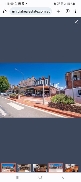 Freehold commercial building with fully equipped Cafe within premises.