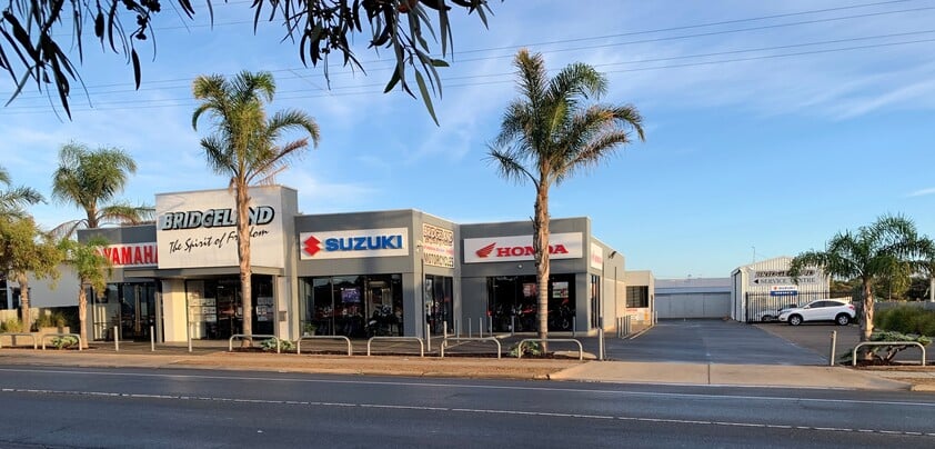 FREEHOLD PREMISES IN PROMINENT POSITION WITH SOLID MOTORCYCLE DEALERSHIP BUSINESS