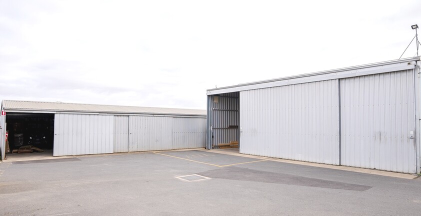 FREEHOLD PREMISES IN PROMINENT POSITION WITH SOLID MOTORCYCLE DEALERSHIP BUSINESS