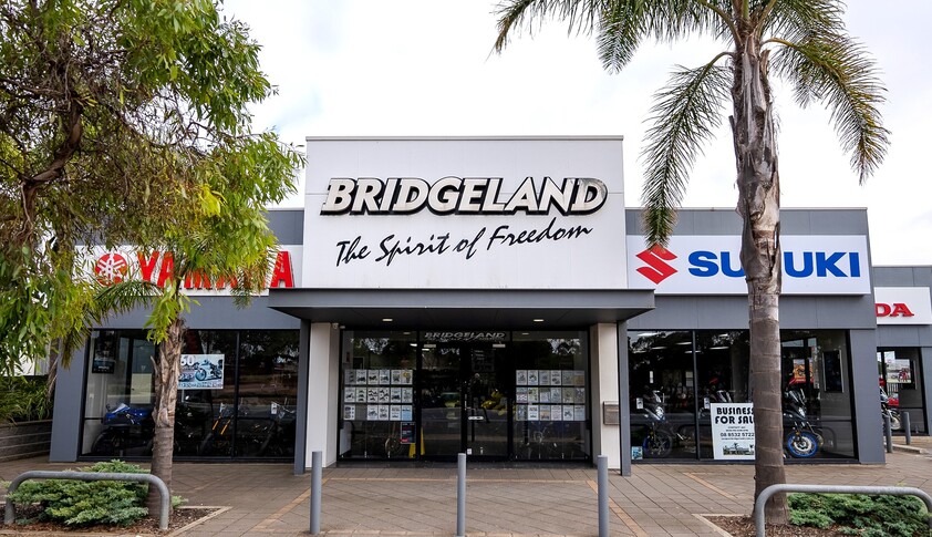 FREEHOLD PREMISES IN PROMINENT POSITION WITH SOLID MOTORCYCLE DEALERSHIP BUSINESS