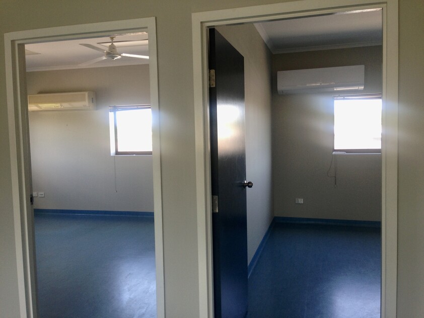 COMMERCIAL DUPLEX ACROSS TWO TITLES