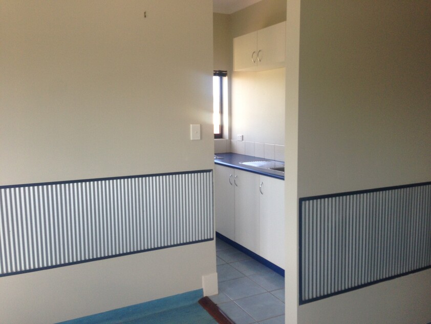 COMMERCIAL DUPLEX ACROSS TWO TITLES