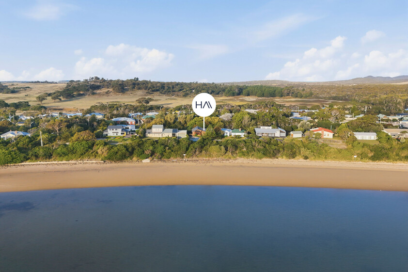 Enchanting Waterfront Living with Private Beach Access