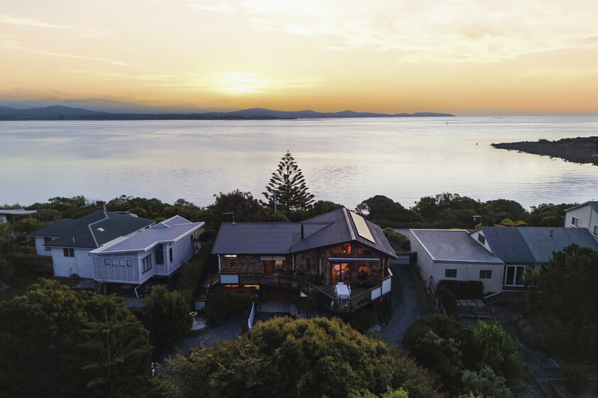 Enchanting Waterfront Living with Private Beach Access