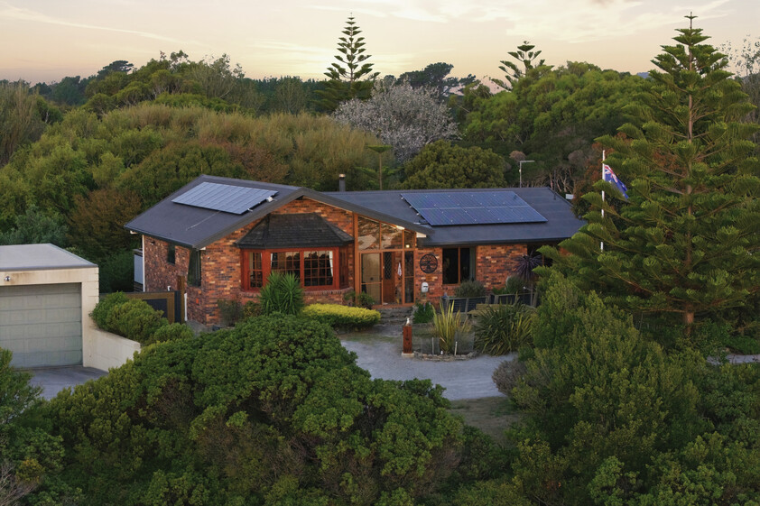 Enchanting Waterfront Living with Private Beach Access