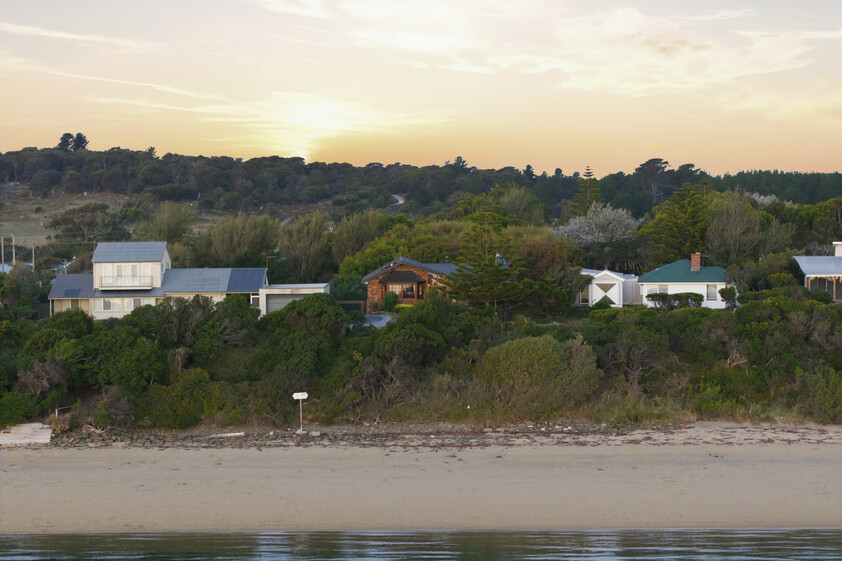 Enchanting Waterfront Living with Private Beach Access