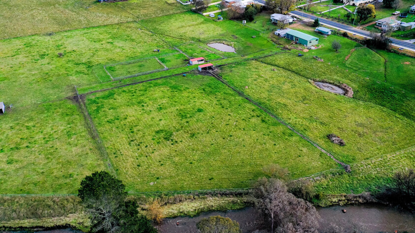 (PENDING) RIVER FRONT AGREAGE with| Renovated Home |EQUINE FACILITIES