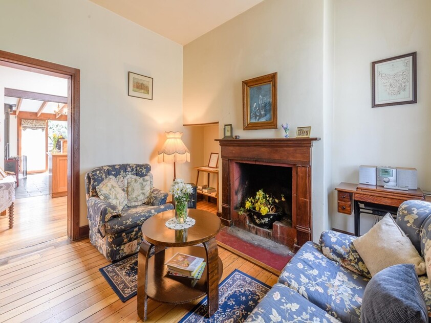 ENJOY VILLAGE LIFE IN FRIENDLY HISTORIC RICHMOND a short drive to Hobart & Airport. 2 CO-JOINED COTTAGES CONVICT BUILT 1823. MULTIPLE OPTION PROPERTY.