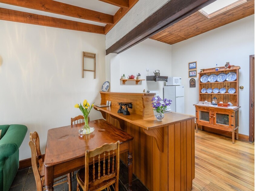 ENJOY VILLAGE LIFE IN FRIENDLY HISTORIC RICHMOND a short drive to Hobart & Airport. 2 CO-JOINED COTTAGES CONVICT BUILT 1823. MULTIPLE OPTION PROPERTY.