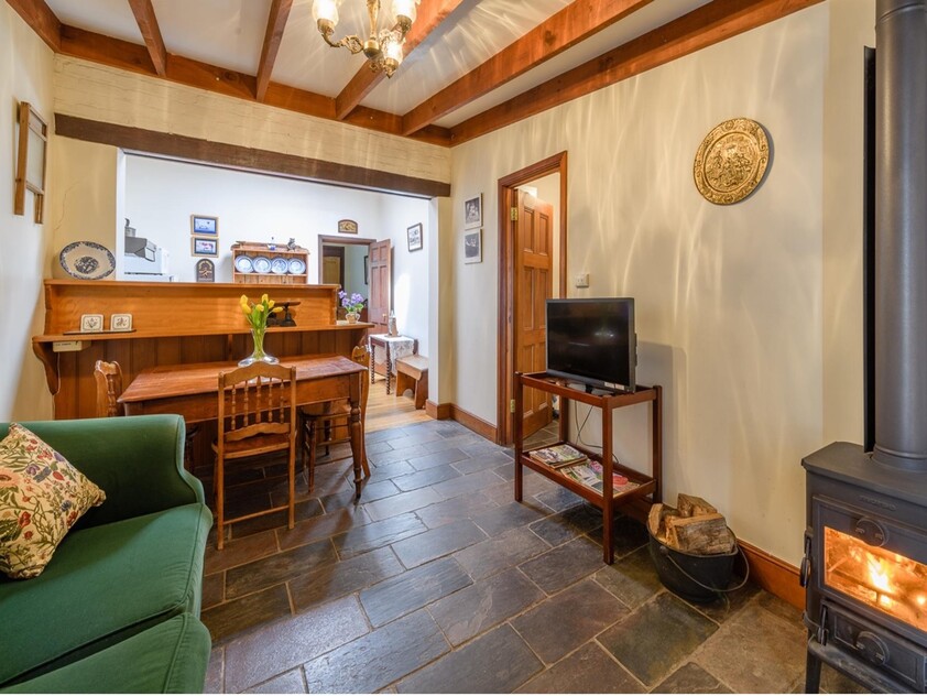 ENJOY VILLAGE LIFE IN FRIENDLY HISTORIC RICHMOND a short drive to Hobart & Airport. 2 CO-JOINED COTTAGES CONVICT BUILT 1823. MULTIPLE OPTION PROPERTY.
