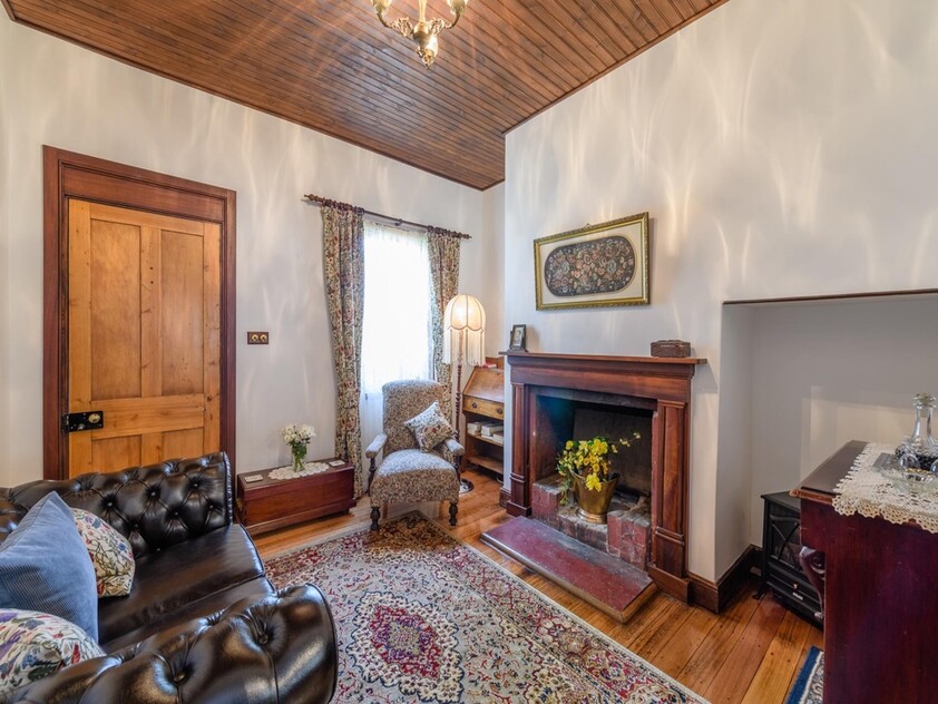 ENJOY VILLAGE LIFE IN FRIENDLY HISTORIC RICHMOND a short drive to Hobart & Airport. 2 CO-JOINED COTTAGES CONVICT BUILT 1823. MULTIPLE OPTION PROPERTY.