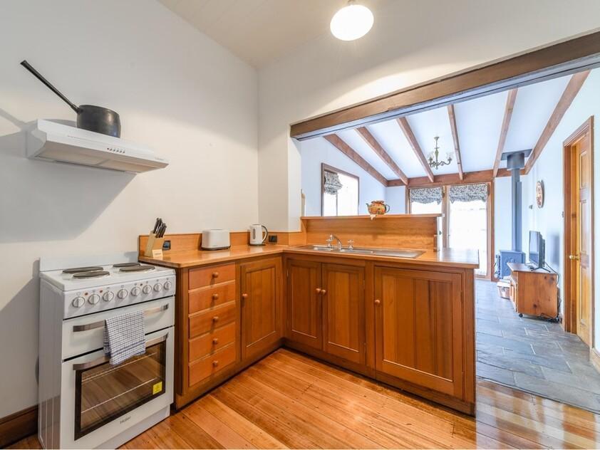ENJOY VILLAGE LIFE IN FRIENDLY HISTORIC RICHMOND a short drive to Hobart & Airport. 2 CO-JOINED COTTAGES CONVICT BUILT 1823. MULTIPLE OPTION PROPERTY.