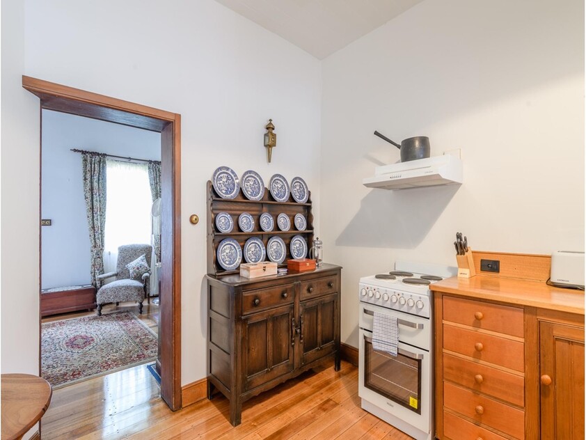 ENJOY VILLAGE LIFE IN FRIENDLY HISTORIC RICHMOND a short drive to Hobart & Airport. 2 CO-JOINED COTTAGES CONVICT BUILT 1823. MULTIPLE OPTION PROPERTY.