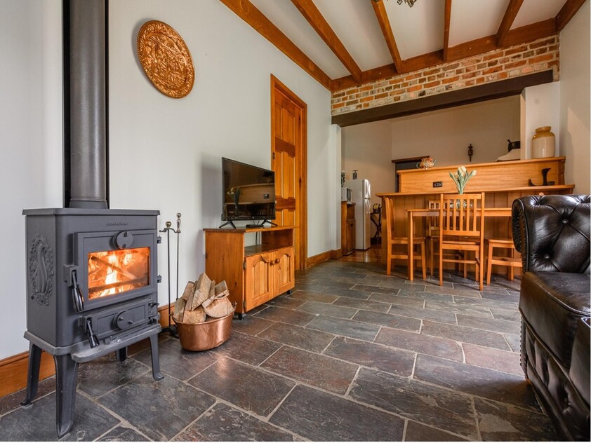 ENJOY VILLAGE LIFE IN FRIENDLY HISTORIC RICHMOND a short drive to Hobart & Airport. 2 CO-JOINED COTTAGES CONVICT BUILT 1823. MULTIPLE OPTION PROPERTY.