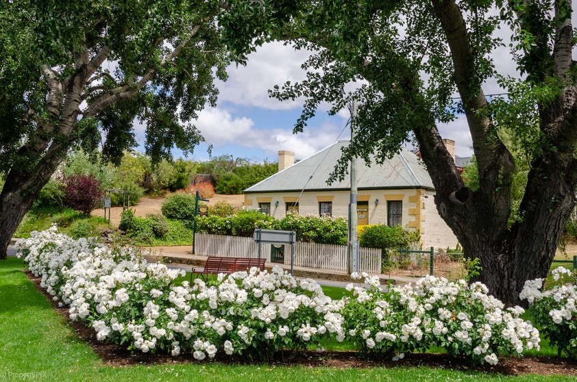 ENJOY VILLAGE LIFE IN FRIENDLY HISTORIC RICHMOND a short drive to Hobart & Airport. 2 CO-JOINED COTTAGES CONVICT BUILT 1823. MULTIPLE OPTION PROPERTY.