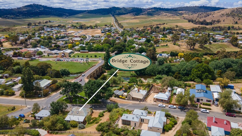 ENJOY VILLAGE LIFE IN FRIENDLY HISTORIC RICHMOND a short drive to Hobart & Airport. 2 CO-JOINED COTTAGES CONVICT BUILT 1823. MULTIPLE OPTION PROPERTY.