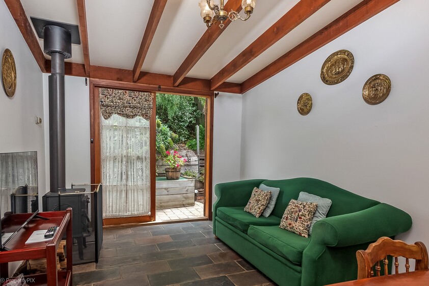 ENJOY VILLAGE LIFE IN FRIENDLY HISTORIC RICHMOND a short drive to Hobart & Airport. 2 CO-JOINED COTTAGES CONVICT BUILT 1823. MULTIPLE OPTION PROPERTY.