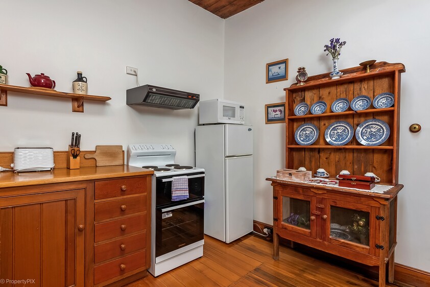 ENJOY VILLAGE LIFE IN FRIENDLY HISTORIC RICHMOND a short drive to Hobart & Airport. 2 CO-JOINED COTTAGES CONVICT BUILT 1823. MULTIPLE OPTION PROPERTY.