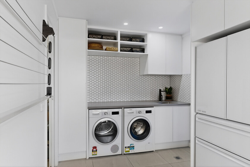Newly Renovated Resort-Style Family Retreat Backing Onto Reserve, Spa, Designer Kitchen & Private Entertaining