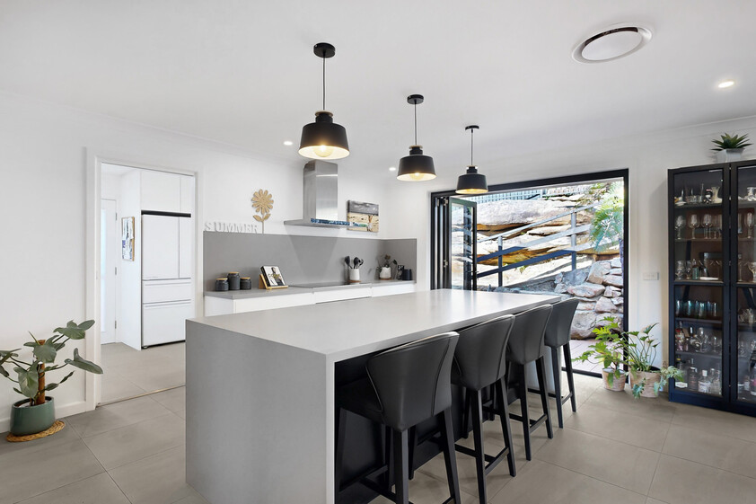 Newly Renovated Resort-Style Family Retreat Backing Onto Reserve, Spa, Designer Kitchen & Private Entertaining