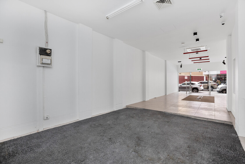SITUATED CENTRE-MOST POSTION ALONG BELMORE ROAD SHOPPING STRIP : HIGH EXPOSURE : RETAIL, MEDICAL SUITE : OFFICE
