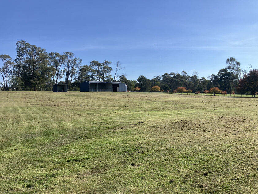 Prime Lifestyle Acreage with Creek Frontage & Quality Infrastructure
